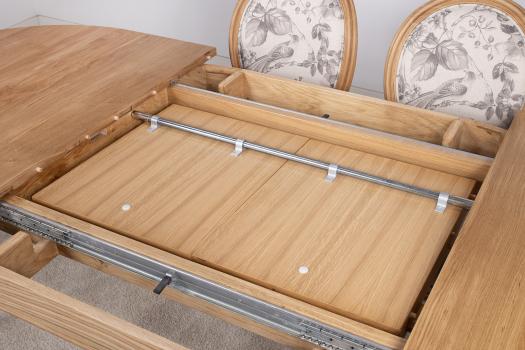 Table ovale 160*100 réalisée en chêne Massif de style Louis Philippe 2 allonges incorporées de 40 cm