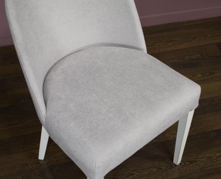 Chaise Edouard, assise et dos capitonnés, pieds en Frêne massif de ligne Contemporaine
