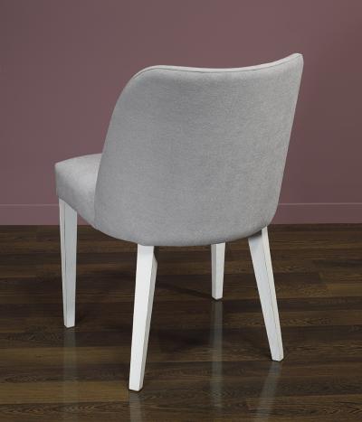 Chaise Edouard, assise et dos capitonnés, pieds en Frêne massif de ligne Contemporaine