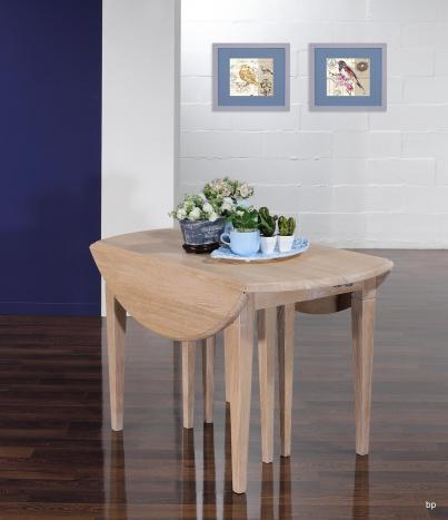 Table ronde à volets Michel, Diamètre 110 réalisée en chêne massif de style Louis Philippe 7 allonges de 40 cm  Pieds Fuseaux