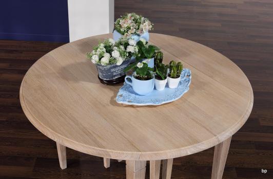 Table ronde à volets Michel, Diamètre 110 réalisée en chêne massif de style Louis Philippe 7 allonges de 40 cm  Pieds Fuseaux