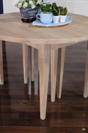 Table ronde à volets Michel, Diamètre 110 réalisée en chêne massif de style Louis Philippe 7 allonges de 40 cm  Pieds Fuseaux