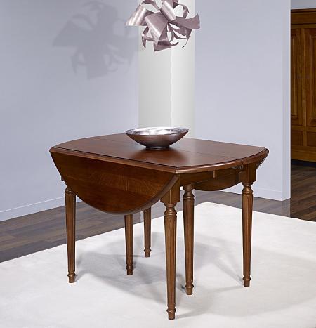 Table ronde à volets Vera réalisée en Chêne Massif de style Louis XVI avec  3 allonges de 40 cm