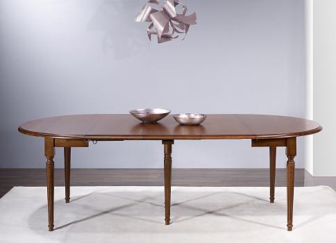 Table ronde à volets Vera réalisée en Chêne Massif de style Louis XVI avec  3 allonges de 40 cm