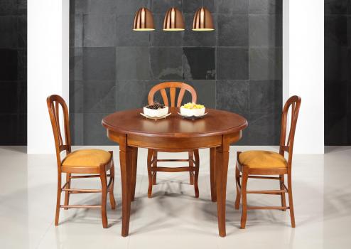 Table ronde 4 pieds Marc-Antoine réalisée en Chêne Massif de style Louis Philippe Diamètre 110  1 allonge portefeuille de 40 cm  Finition Chêne moyen