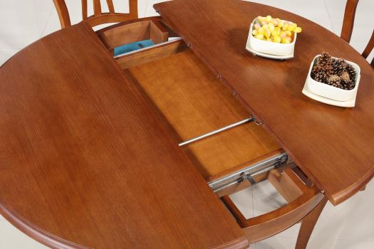 Table ronde 4 pieds Marc-Antoine réalisée en Chêne Massif de style Louis Philippe Diamètre 110  1 allonge portefeuille de 40 cm  Finition Chêne moyen