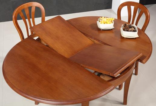 Table ronde 4 pieds Marc-Antoine réalisée en Chêne Massif de style Louis Philippe Diamètre 110  1 allonge portefeuille de 40 cm  Finition Chêne moyen