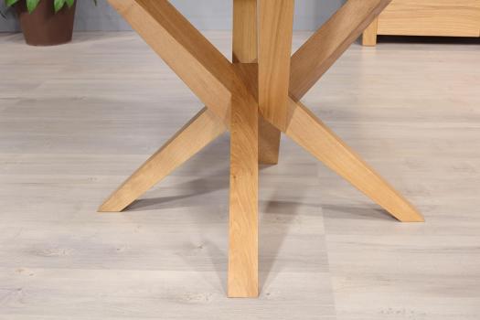 Table ronde Contemporaine Romain, diamètre 120 cm réalisée en chêne avec un pieds central et 1 allonge portefeuille de 50 cm 